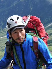 成田 賢二
